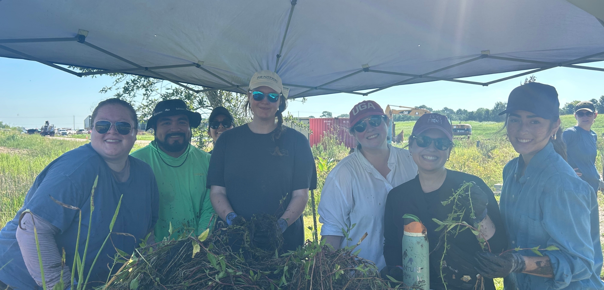 Digging In: AET Houston Volunteers Get Their Hands Dirty for Wetland Restoration 