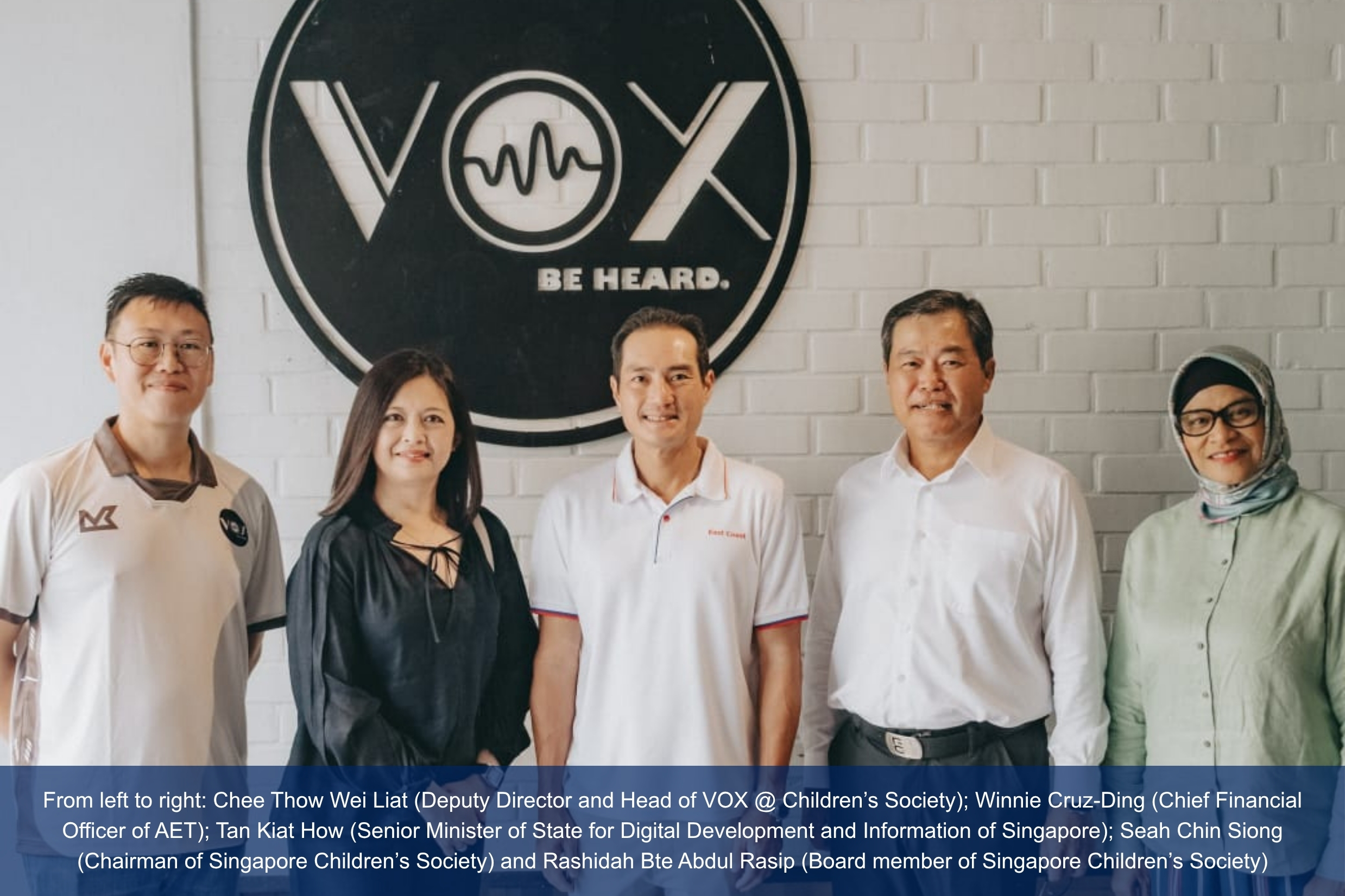 Group photo with Minister and Singapore Children's Society staff